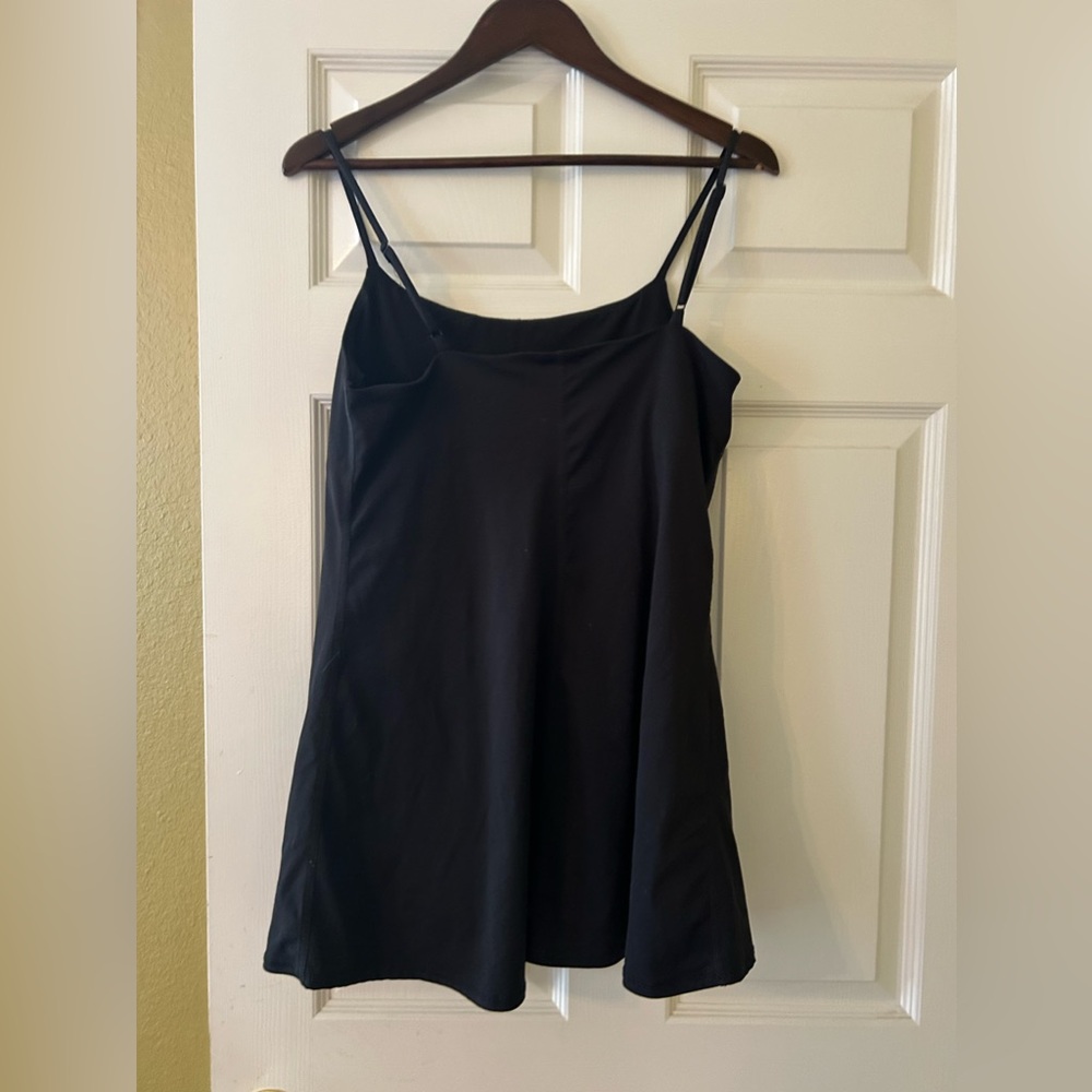 GARAGE swim dress.  Size large.  Black, built in shorts.  Adjustable straps.